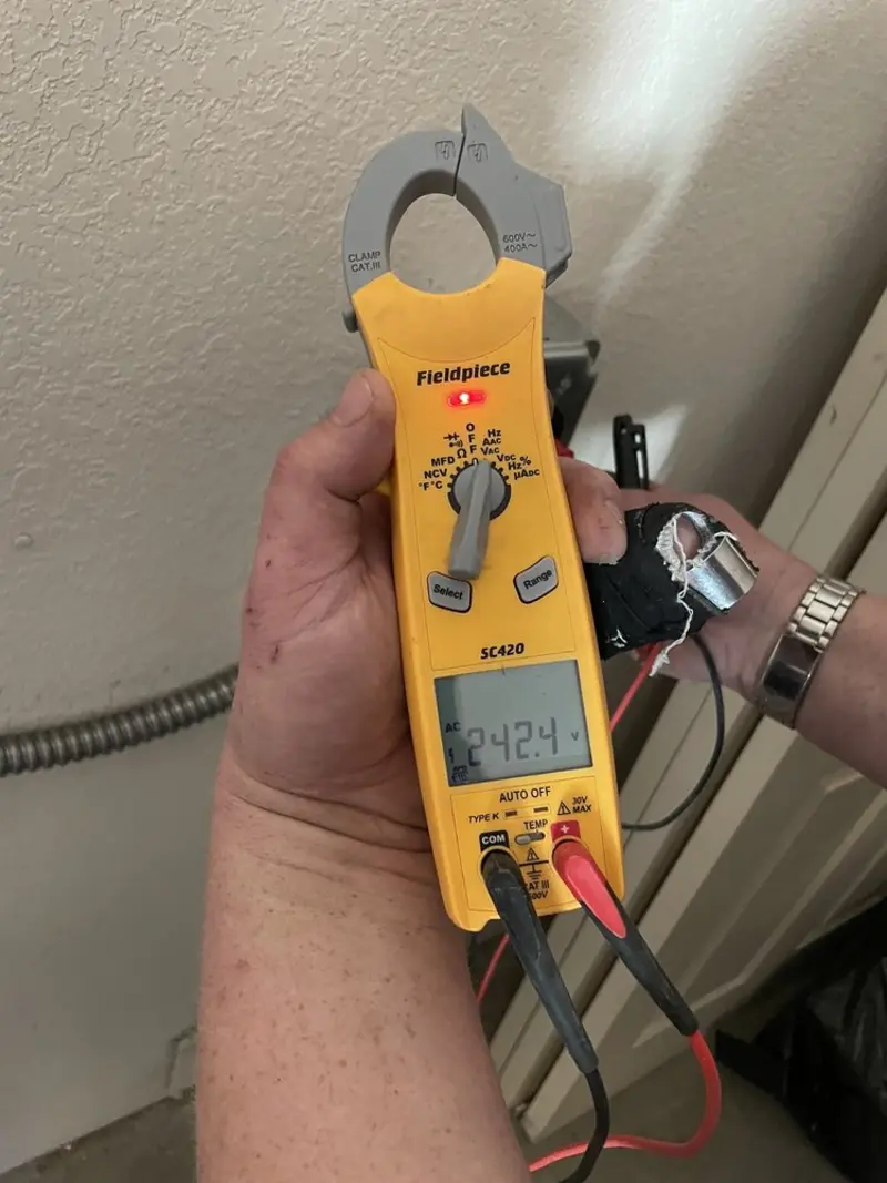 Voltage testing with clamp meter during Circuit Breaker Repair in West Donegal